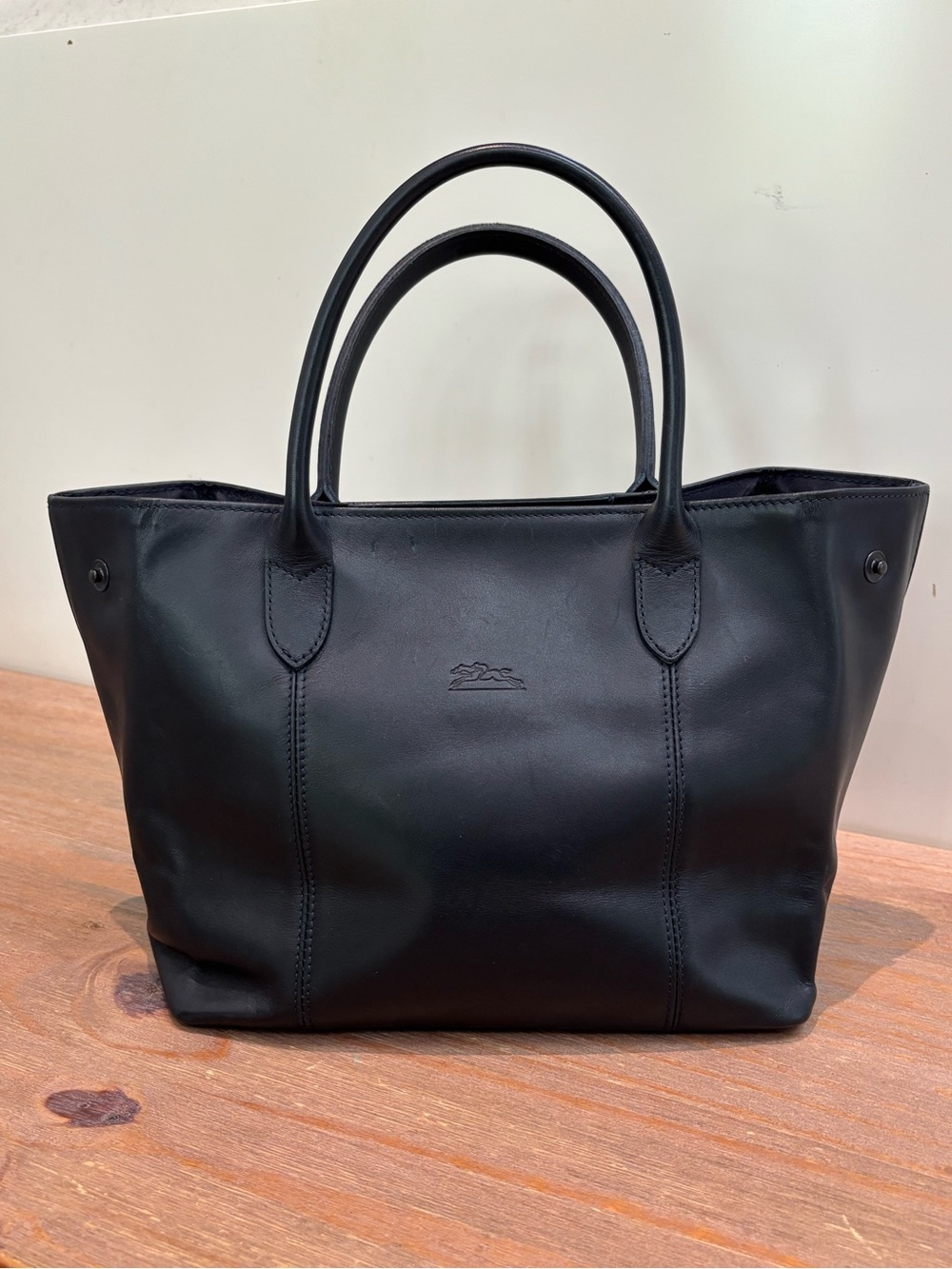 Longchamp black leather small tote $1,200